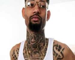 He was a tattoo freak and had many tattoos on his neck and arms He was a tattoo freak and had many tattoos on his neck and arms.
